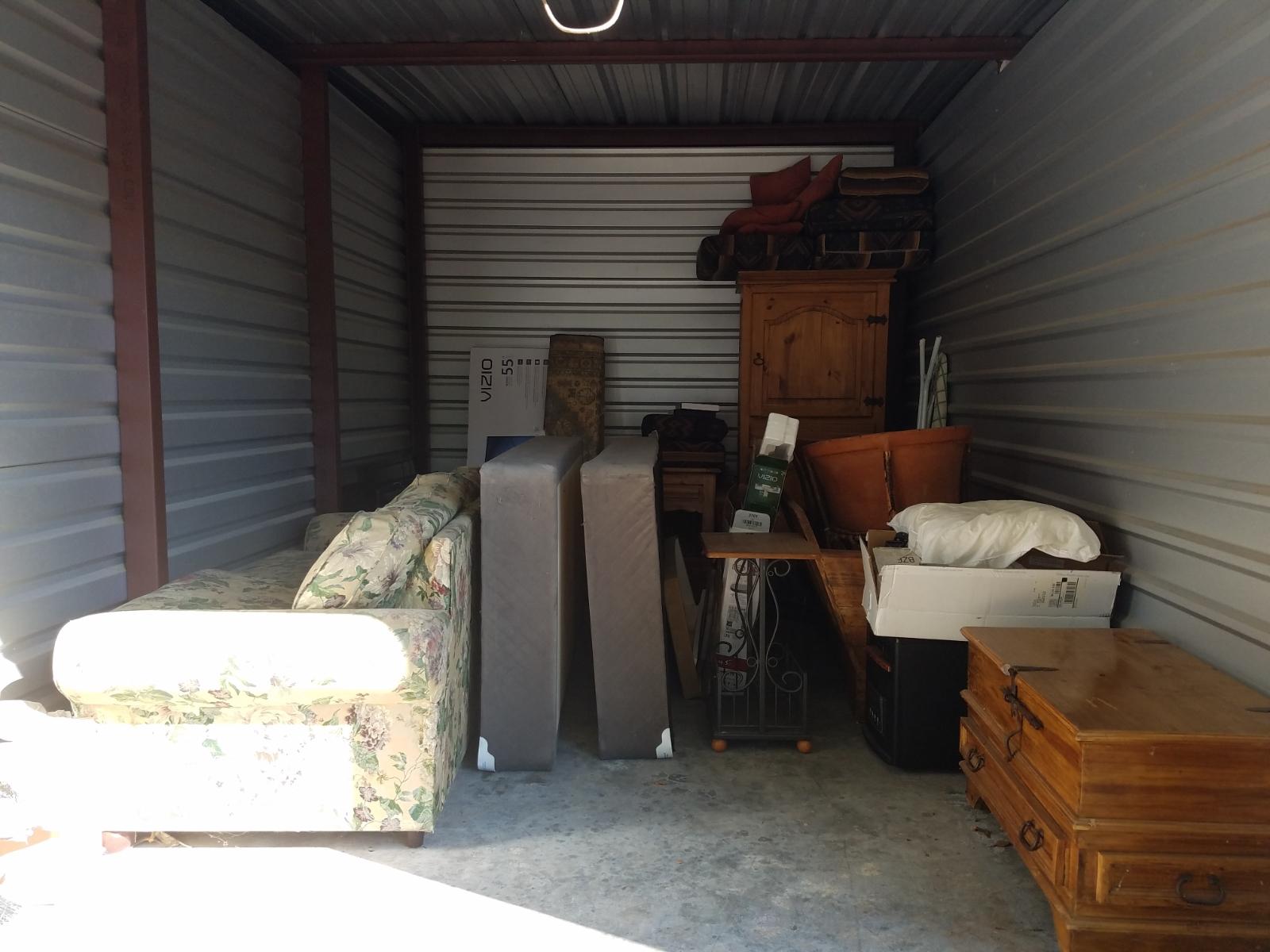 Owasso  Self Storage Auction #50608 - Image boxes,cabinet,furniture,mattress